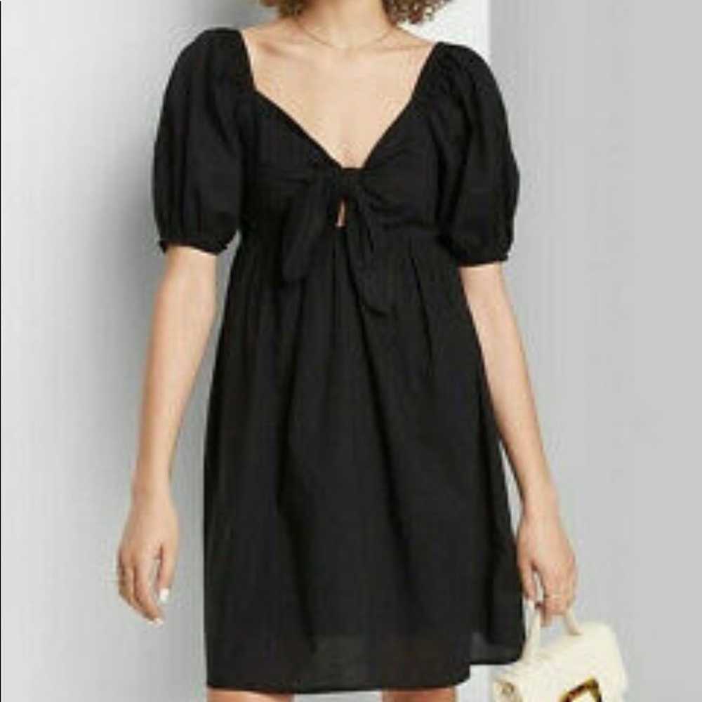 Little black dress with puff sleeves